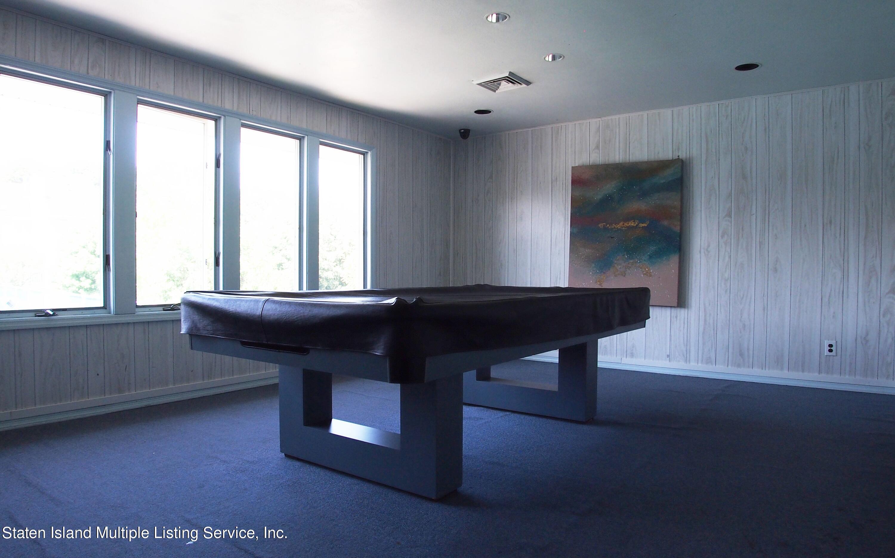 114 Commodore Drive Staten Island, NY 10309 - Photo 30 of 31 a room with a window and a sink