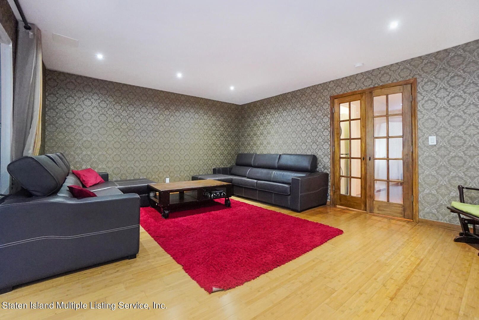 114 Commodore Drive Staten Island, NY 10309 - Photo 4 of 31 a living room with furniture pool table and a couch