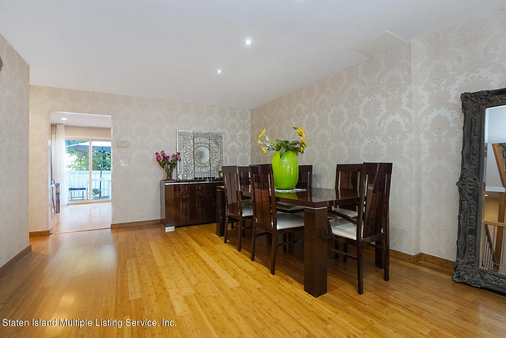 114 Commodore Drive Staten Island, NY 10309 - Photo 10 of 31 a living room with furniture and a wooden floor