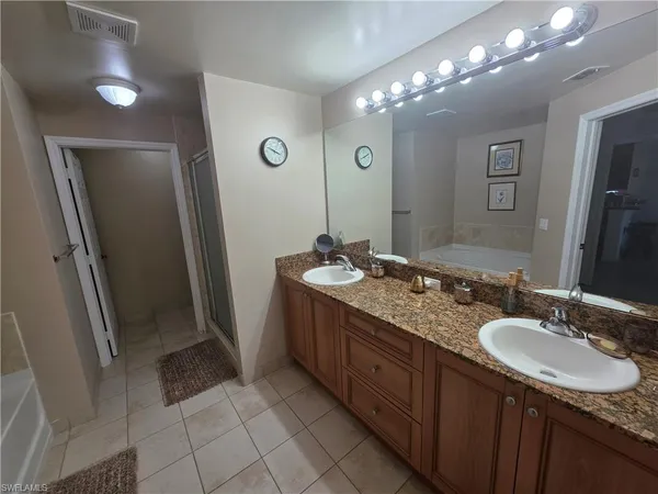 $355,000 | 10127 Villagio Palms Way, Unit 203, Estero, FL 33928