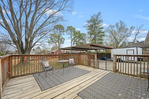 a lake view with large trees