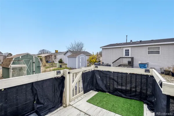 a view of a chairs and table on the terrace