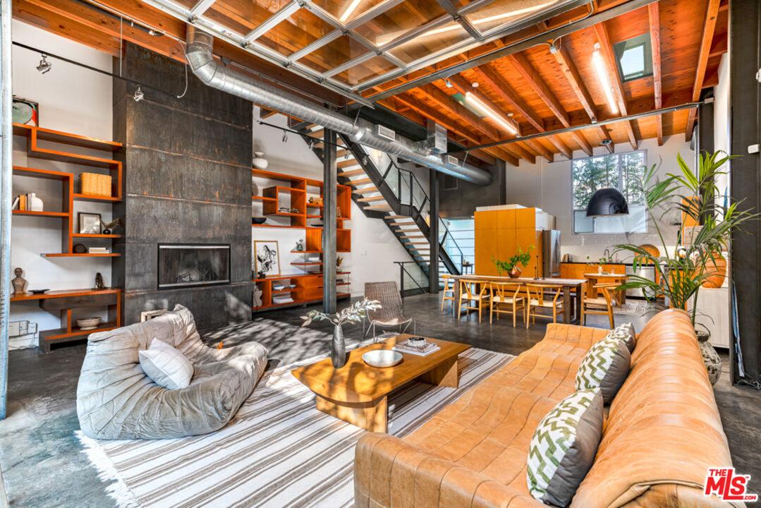 25 Brooks Avenue, Unit 3 Venice, CA 90291 - Photo 5 of 34 a outdoor space with patio lots of furniture and a fireplace