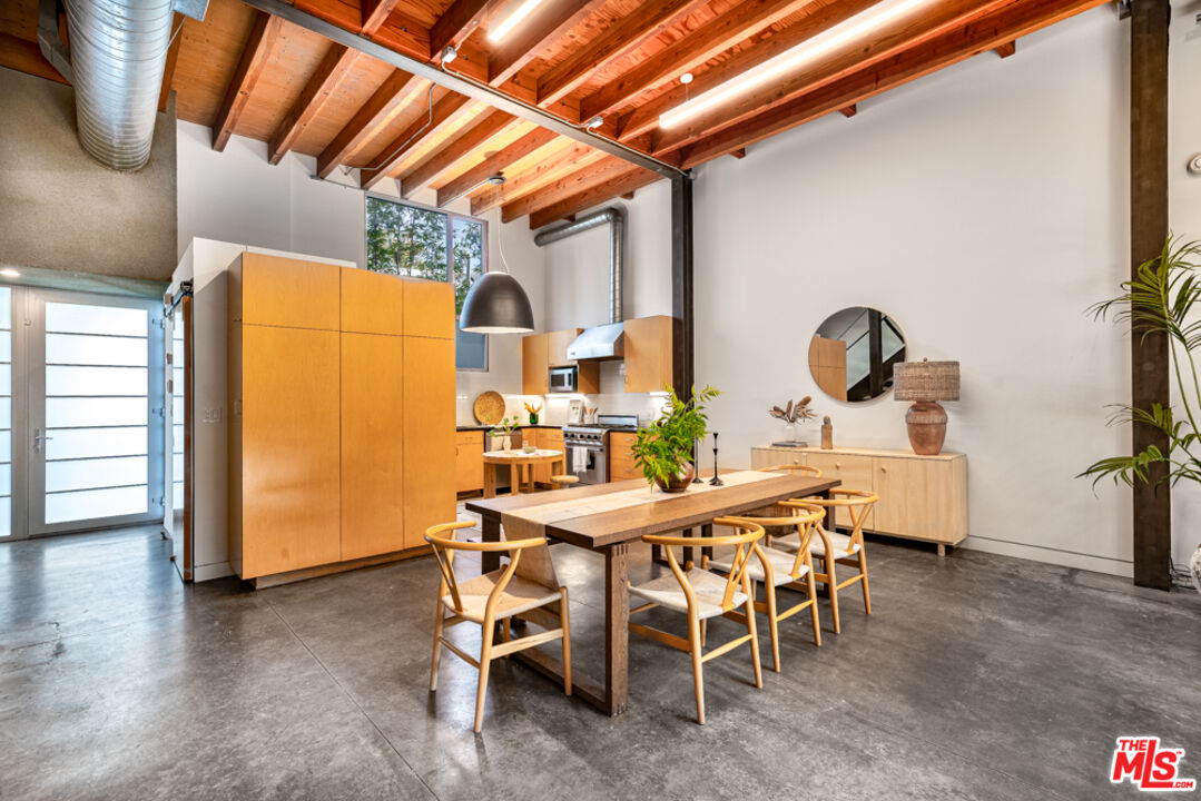 25 Brooks Avenue, Unit 3 Venice, CA 90291 - Photo 6 of 34 a view of a dining room with furniture