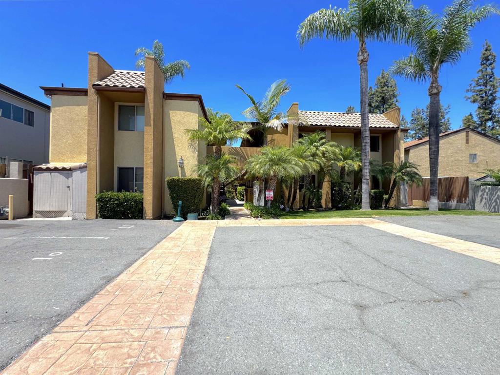 472 Graves Avenue, Unit 12 El Cajon, CA 92020 - Photo 3 of 10 a front view of a house with a yard