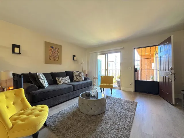 a living room with furniture and a couch
