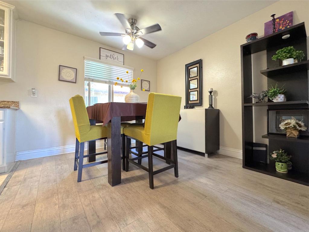 472 Graves Avenue, Unit 12 El Cajon, CA 92020 - Photo 5 of 10 a view of a dining room with furniture and a kitchen