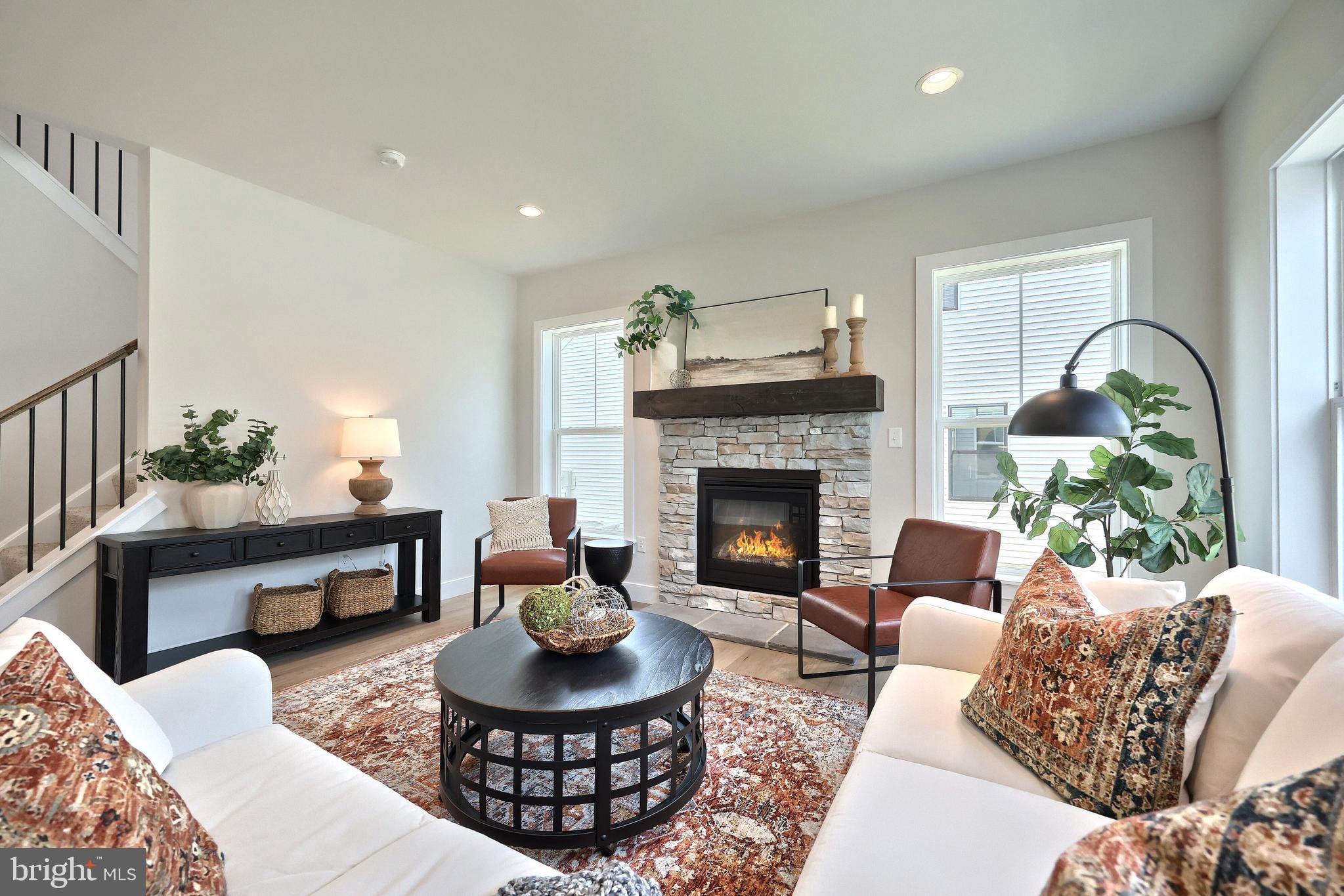 35 Vista Court Lititz, PA 17543 - Photo 8 of 32 a living room with furniture and a fireplace