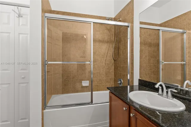 a view of a hallway with washer and dryer