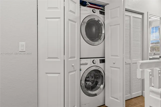 a view of a door and wooden floor