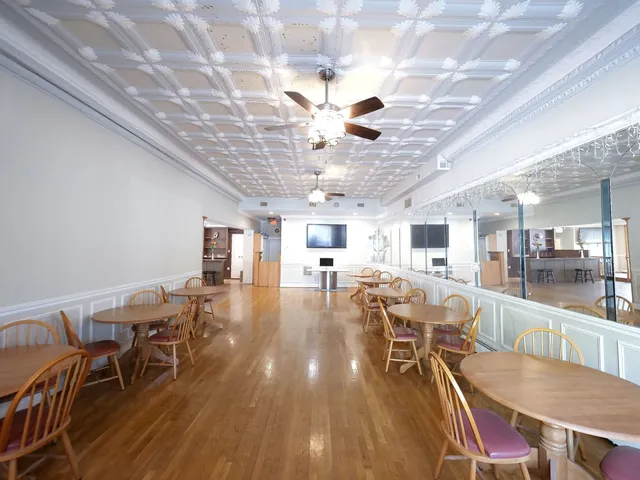 a kitchen with a sink appliances and cabinets