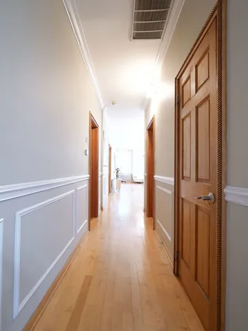 a living room with furniture and windows