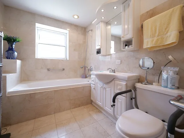 a work room with furniture and windows