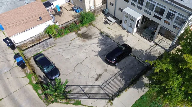 a room with lots of dining room and chandelier