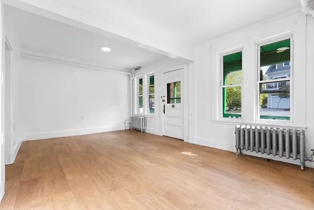 an empty room with windows