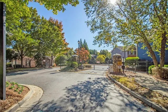 a view of a yard with a tree