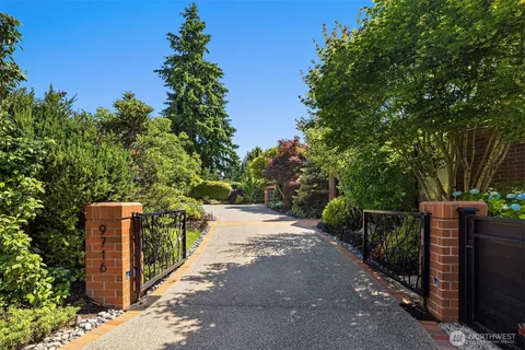 a wooden fence with trees in the background