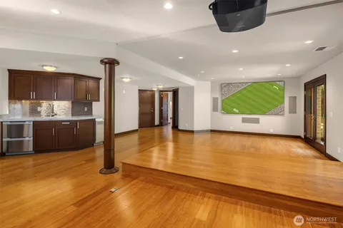 a view of kitchen and a microwave