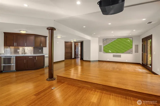 a view of kitchen and a microwave