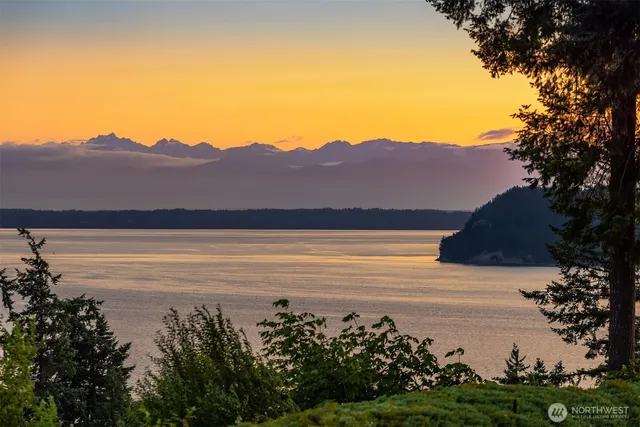 a view of ocean and mountain