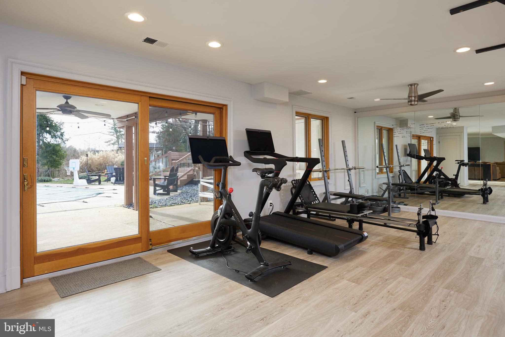 9904 Bluegrass Road Potomac, MD 20854 - Photo 53 of 68 Workout station with "optional sauna." Large SGD.