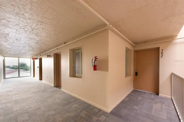 a view of hallway with livingroom