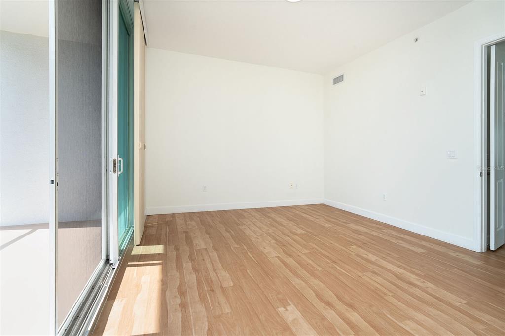 1375 Beach Road, Unit 210 Englewood, FL 34223 - Photo 36 of 49 a view of a room with wooden floor