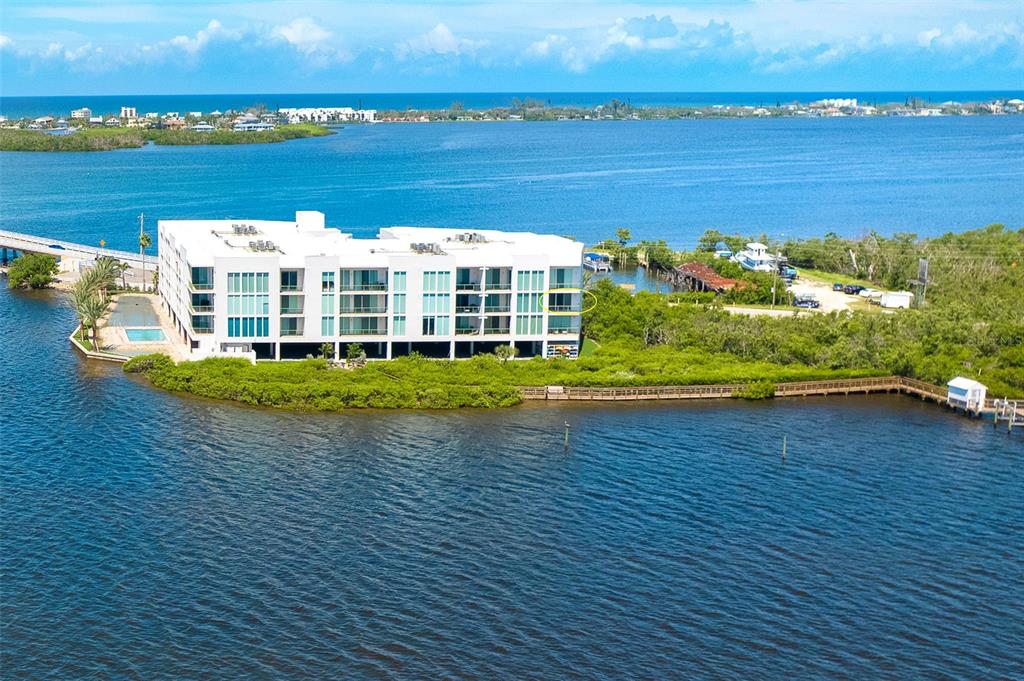 1375 Beach Road, Unit 210 Englewood, FL 34223 - Photo 48 of 49 a view of a city with an ocean view