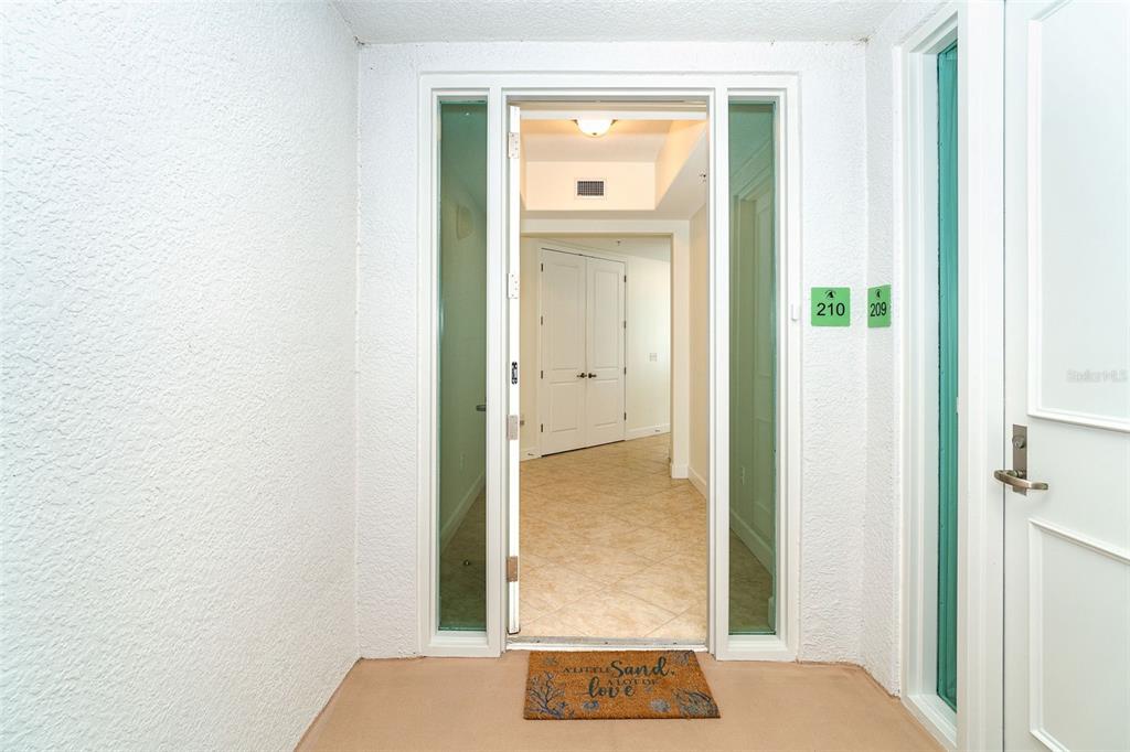 1375 Beach Road, Unit 210 Englewood, FL 34223 - Photo 6 of 49 a view of an front door