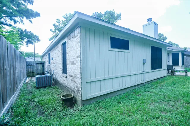 a backyard of a house with lots of green space