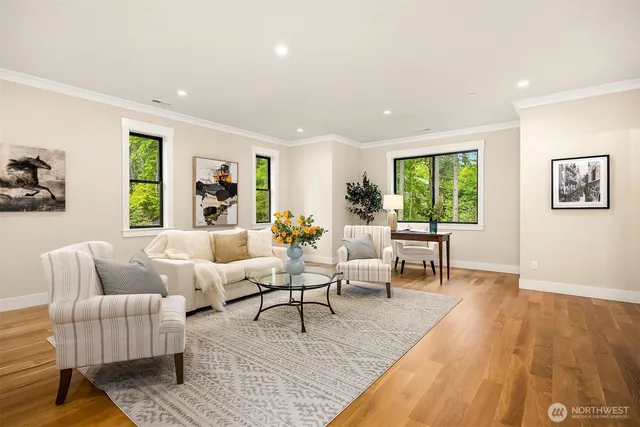 a living room with furniture and a table
