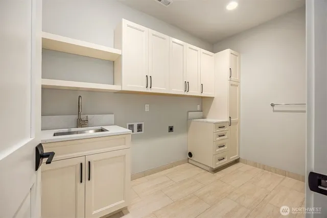 a view of a kitchen with cabinets