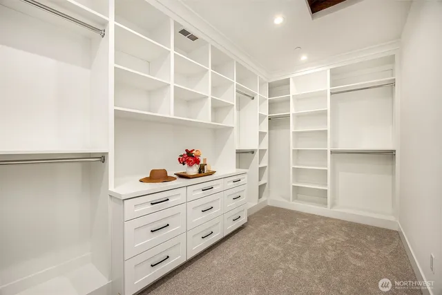a view of an empty walk in closet