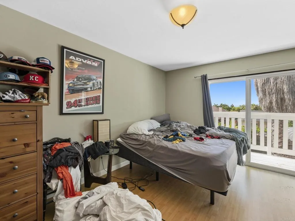 1074 Balour Drive Encinitas, CA 92024 - Photo 11 of 37 a bed room with furniture and a window