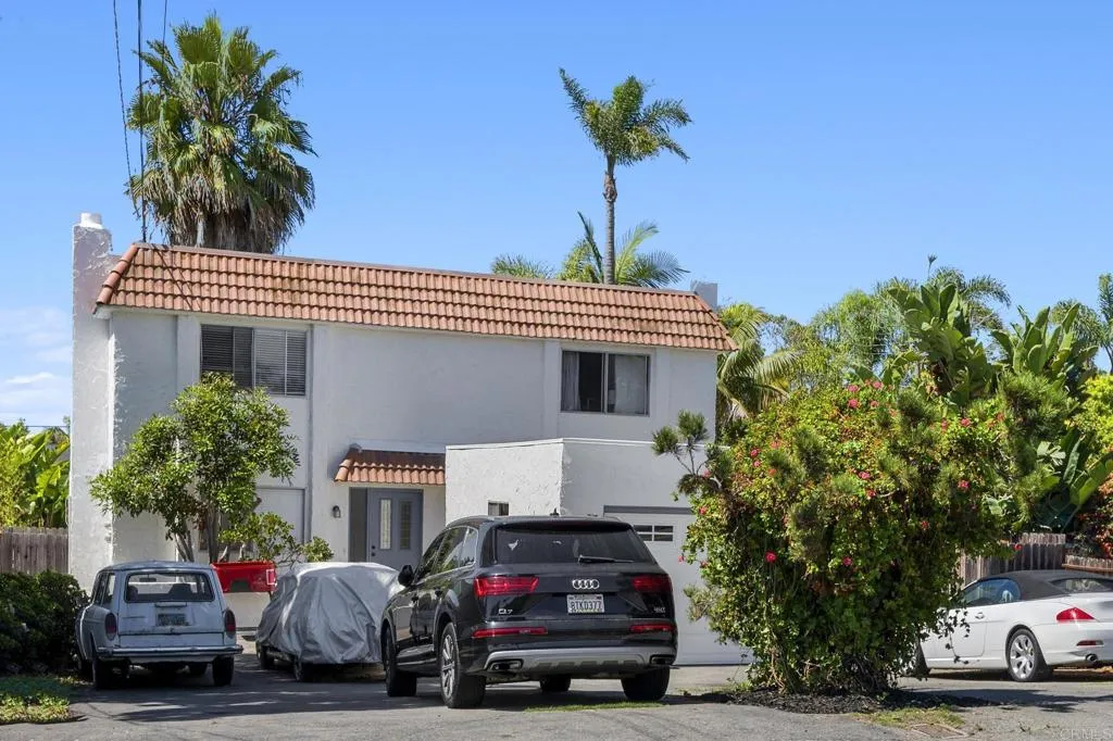 1074 Balour Drive Encinitas, CA 92024 - Photo 2 of 37 a car parked in front of a house