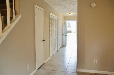a bathroom with a shower and a sink