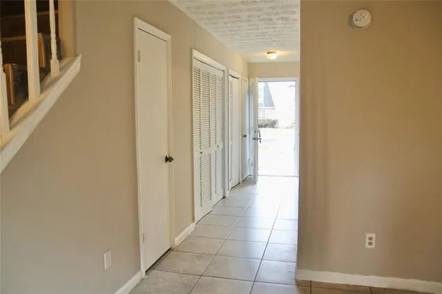 a bathroom with a shower and a sink