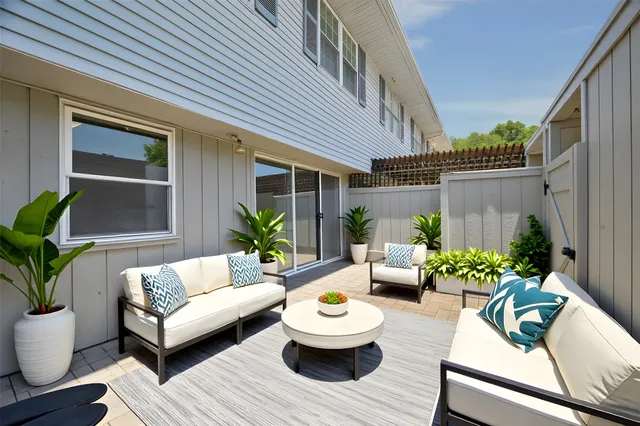 a garden with trees in front of it