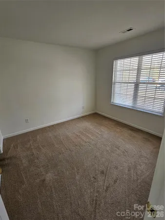 en empty room with windows