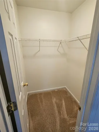 a view of a room with racks on the wall