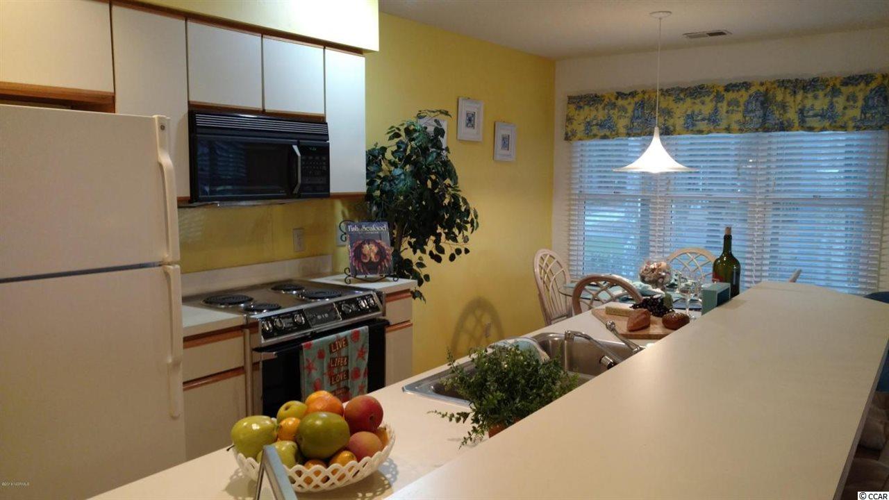 215 Clubhouse Road, Unit 203 Sunset Beach, NC 28468 - Photo 3 of 25 Gallery Image 3