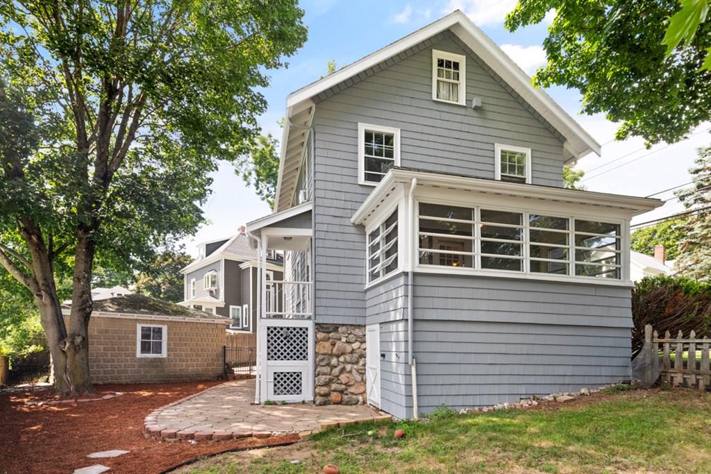 42 Spring Street Wakefield, MA 01880 - Photo 30 of 30 a view of a house with a yard