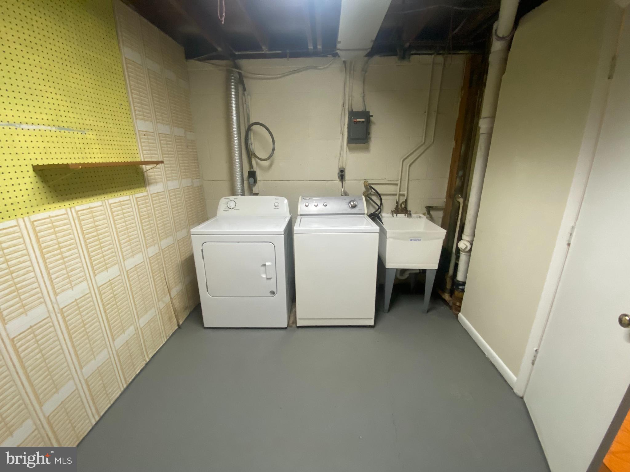 11602 Le Baron Terrace Silver Spring, MD 20902 - Photo 17 of 24 a utility room with dryer and washer