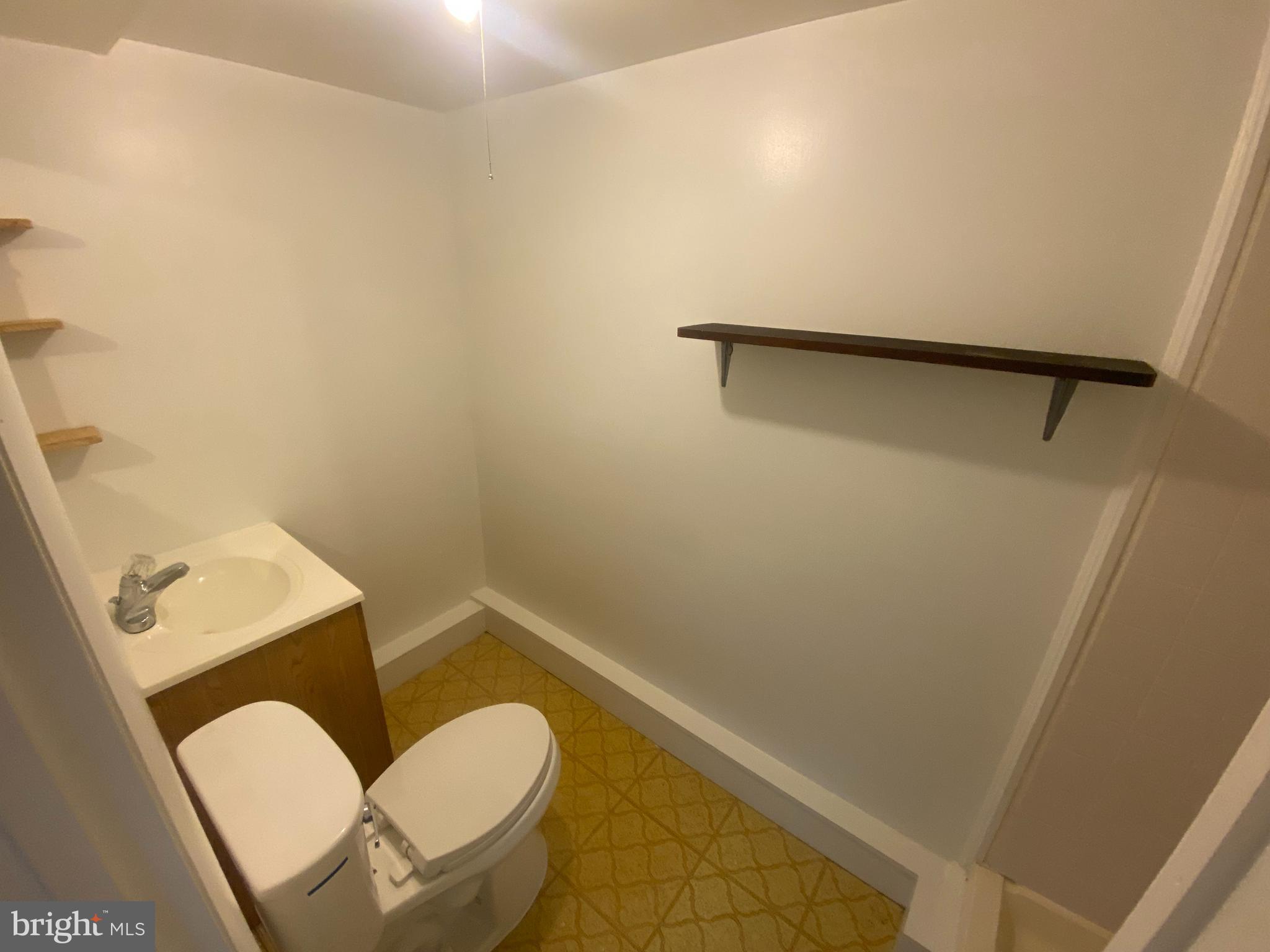 11602 Le Baron Terrace Silver Spring, MD 20902 - Photo 19 of 24 a bathroom with a toilet and a sink