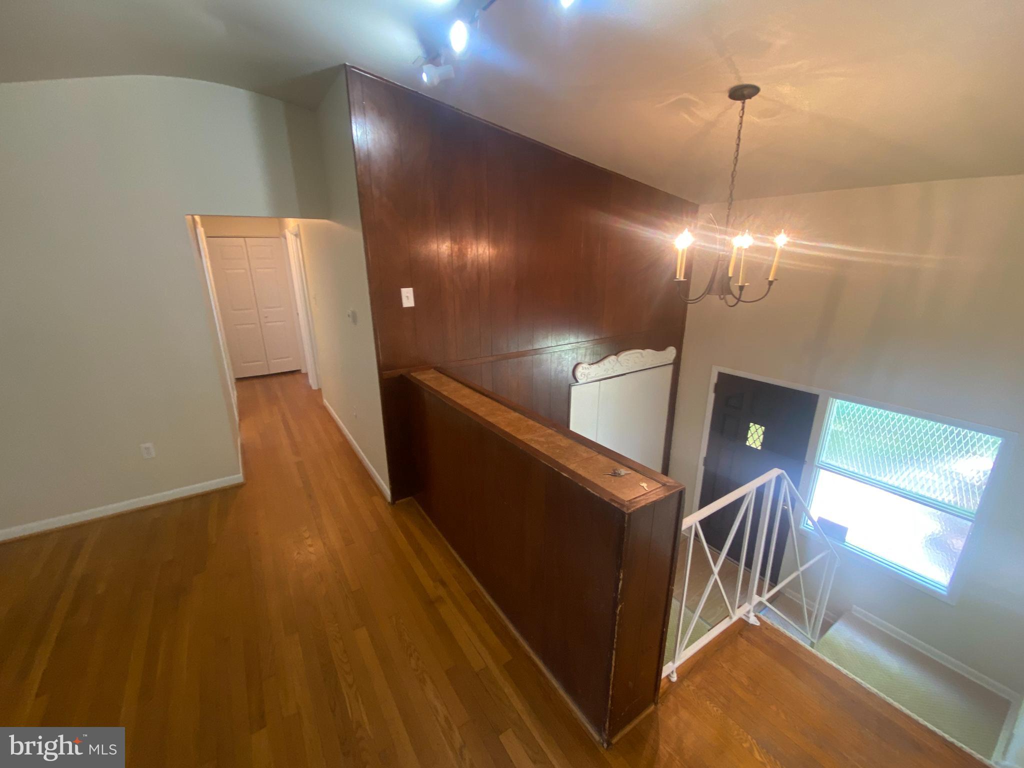 11602 Le Baron Terrace Silver Spring, MD 20902 - Photo 4 of 24 a view of entryway and hall with wooden floor