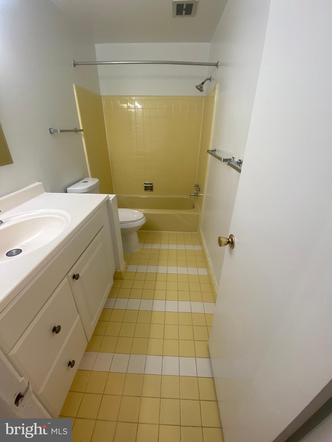 11602 Le Baron Terrace Silver Spring, MD 20902 - Photo 8 of 24 a bathroom with a sink and a shower