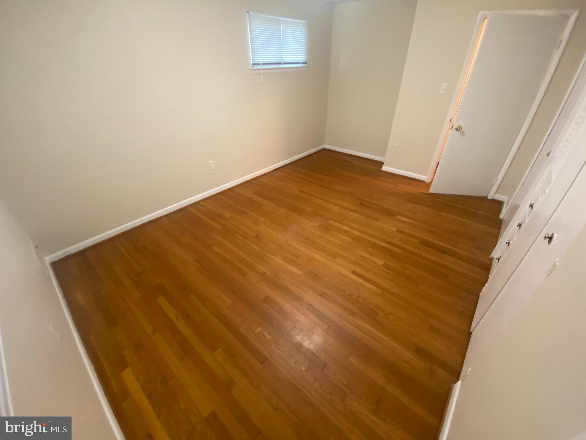 11602 Le Baron Terrace Silver Spring, MD 20902 - Photo 10 of 24 a view of empty room with wooden floor