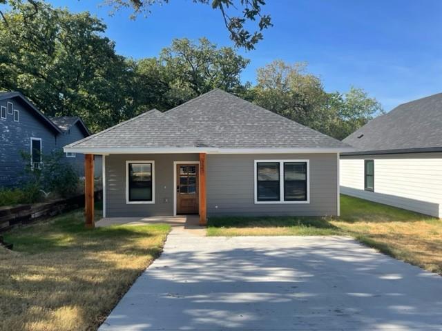 727 East Gandy Street Denison, TX 75021 - Photo 1 of 1 a view of a house with a yard