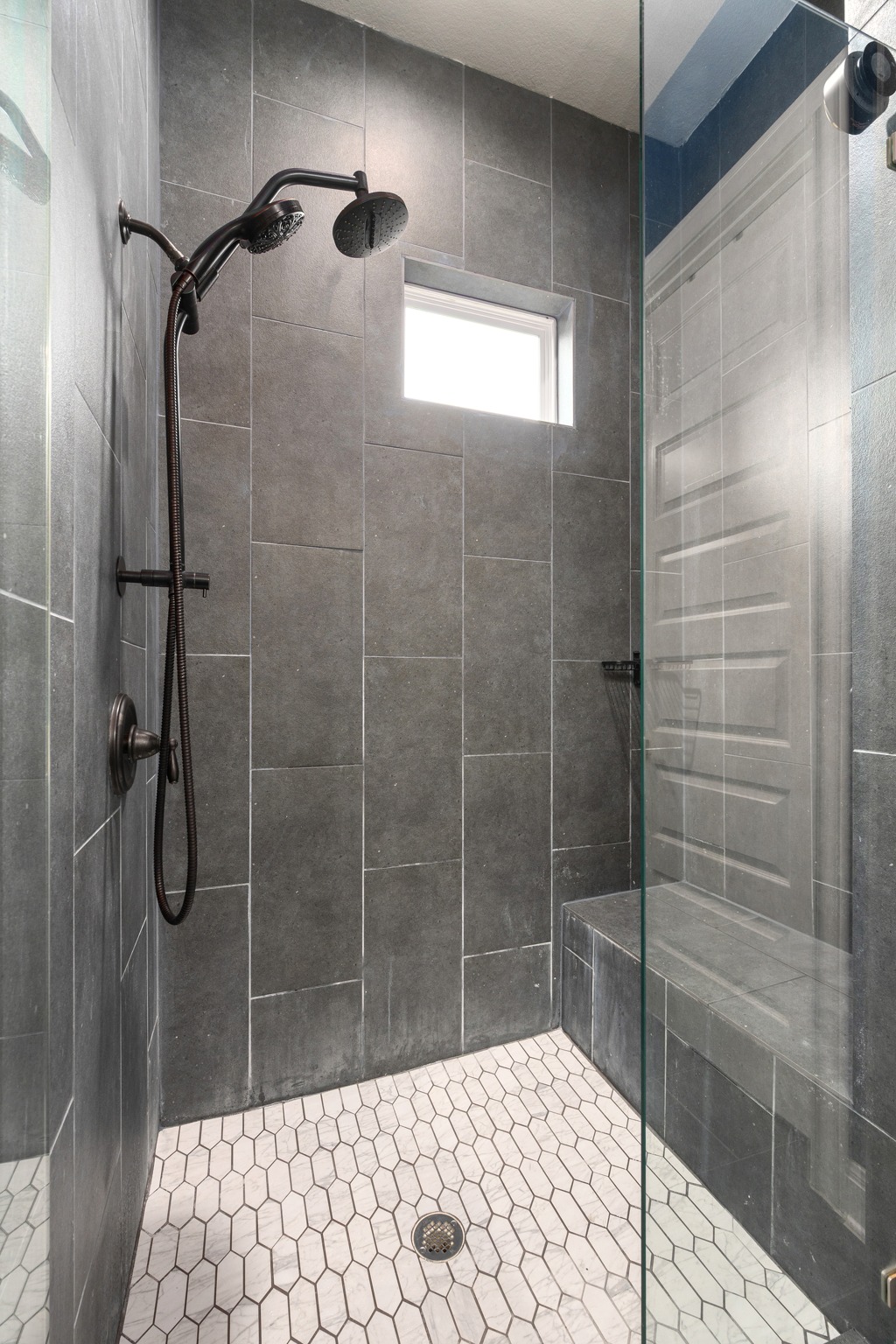 3925 Tavarez Street Round Rock, TX 78628 - Photo 17 of 27 Upgraded primary shower with ledge