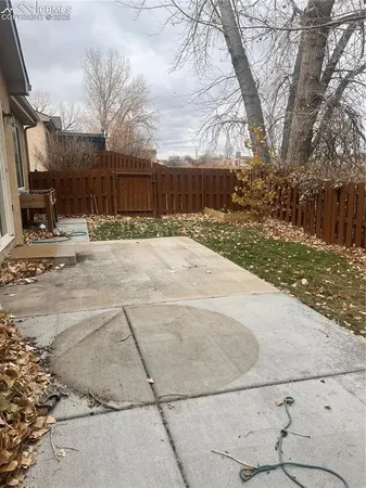 a street view with wooden fence